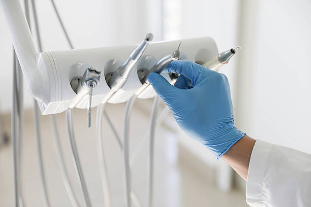 Professional Tooth Extraction technician working in Aquebogue, NY